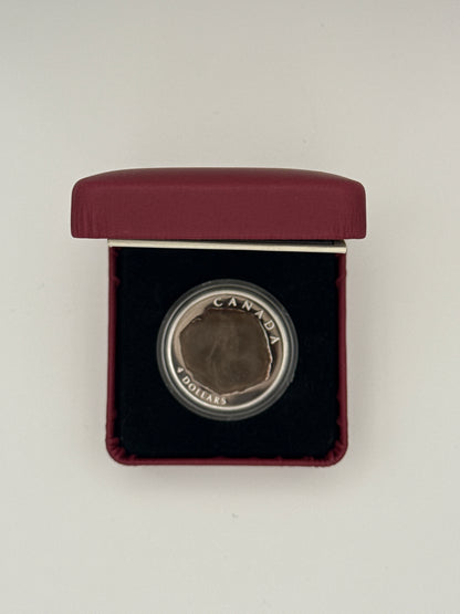 2010 Canada $4 fine silver Dinosaur Collection coin, Dromaeosaurus fossil design (view 2)