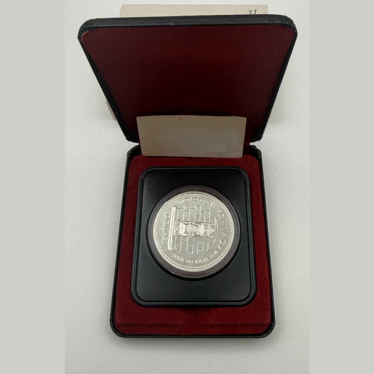 1977 Canada $1 Silver Jubilee silver dollar (Case + box + inspection slip) - back