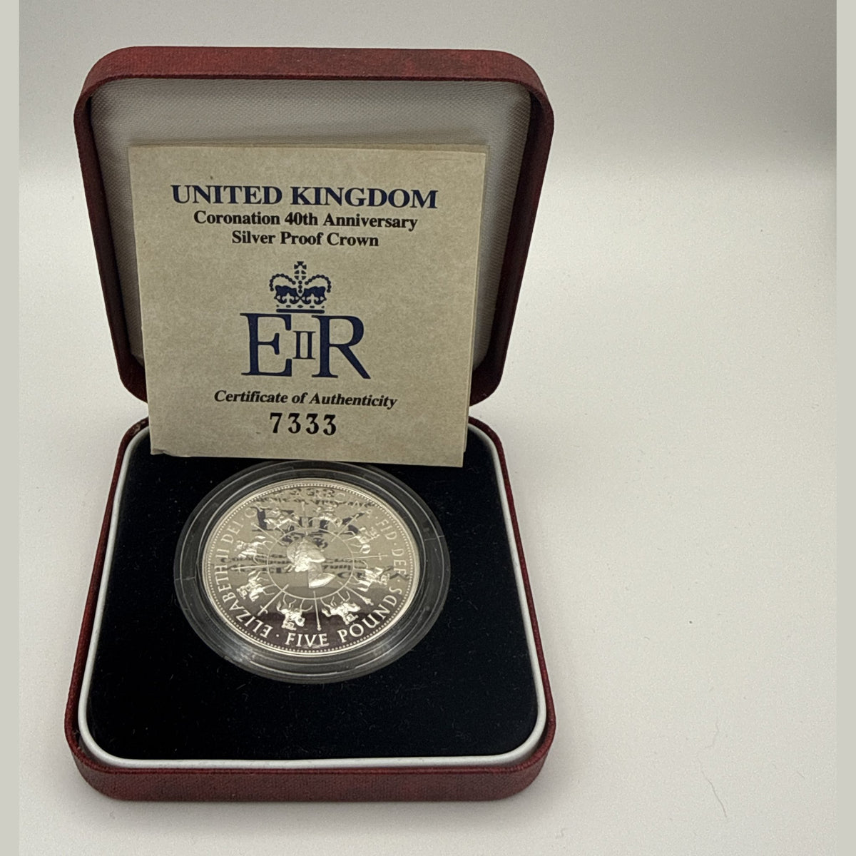 1993 UK £5 Coronation 40th anniversary sterling silver proof crown, St Edward's Crown ringed by trumpets (view 3)