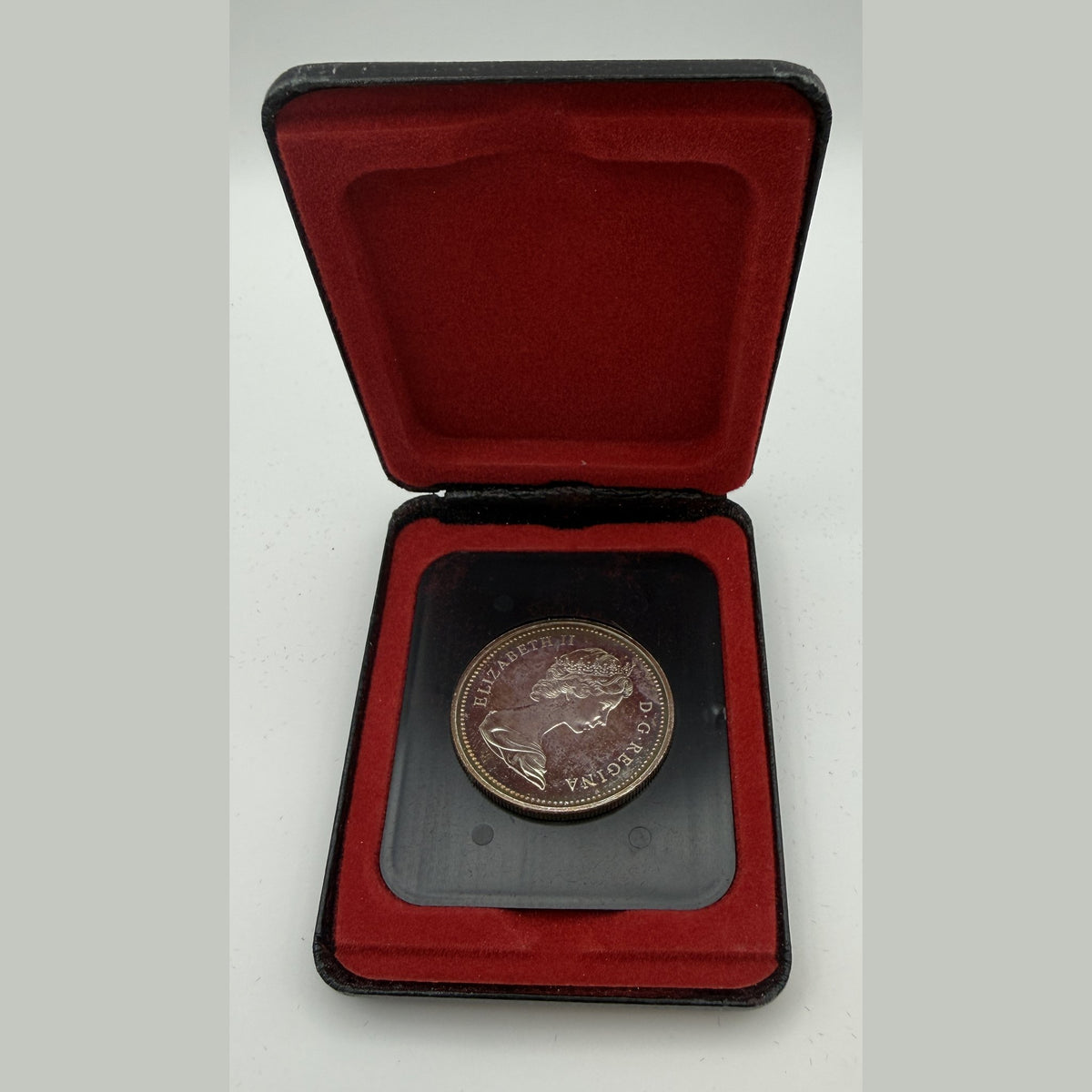 1971 Canada $1 British Columbia Centennial silver dollar, toned (Case only – #2) - front