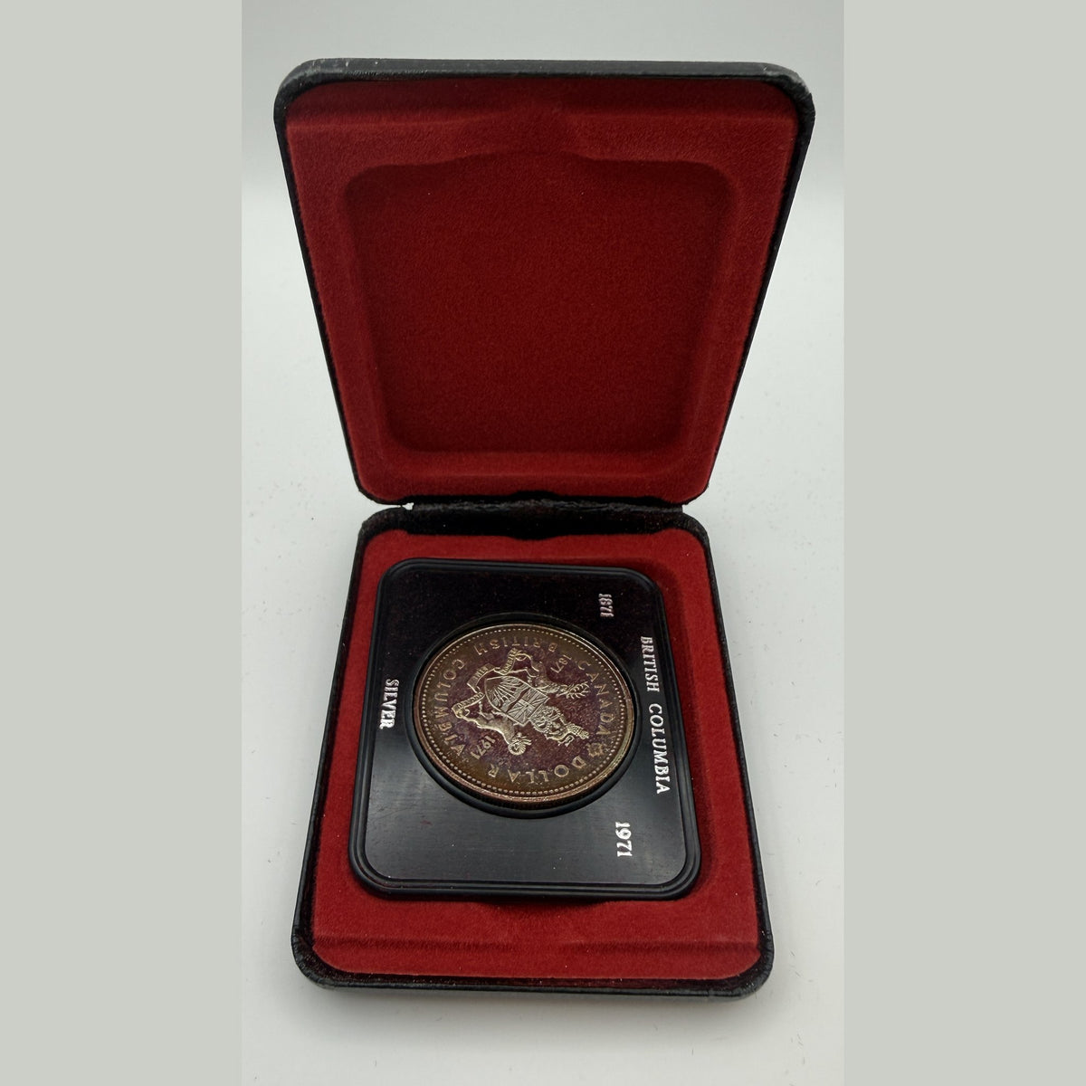 1971 Canada $1 British Columbia Centennial silver dollar, toned (Case only – #2) - back